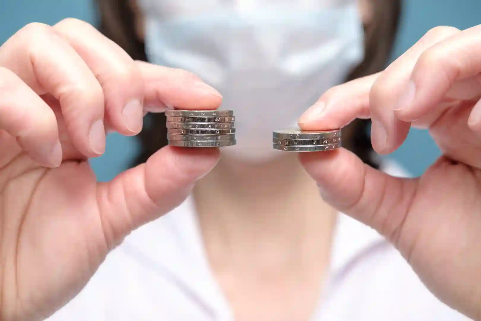 compare-piles-of-coins-of-different-sizes-pointin-2023-11-27-05-05-56-utc-1 Cost of Dental Implants in Turkey vs USA